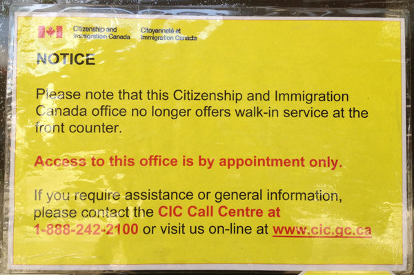 Laminated sign taped to the doors of the remaining Citizenship and Immigration Canada