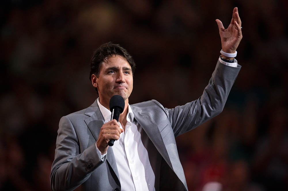 JustinTrudeauHandUp.jpg