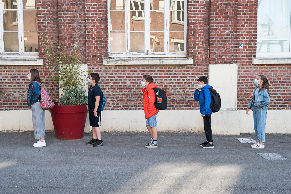 StudentsCovidLineupSchool.jpg