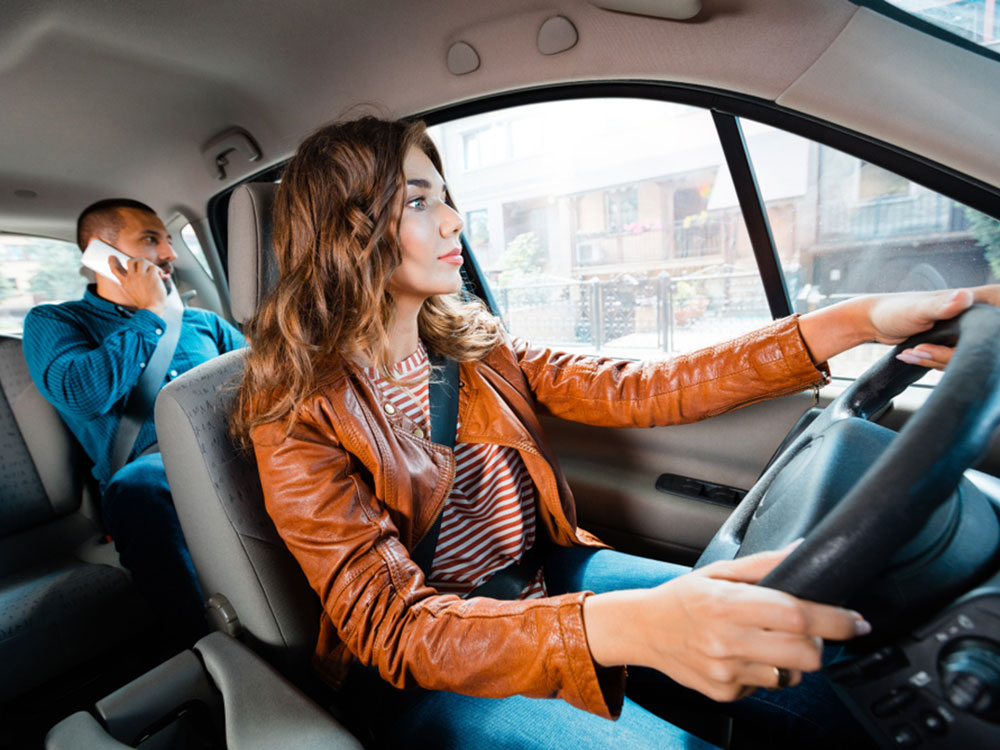 WomanDrivingRideShare.jpg