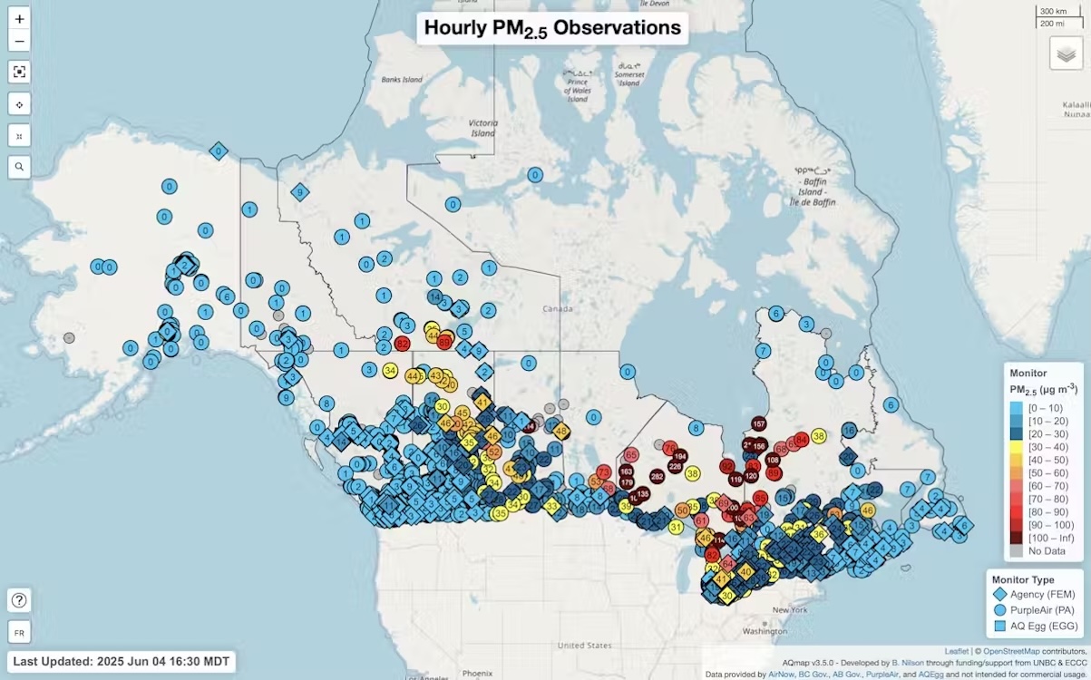 A digital map of Canada features blue, yellow and red markers to indicate changes in air quality across the country.