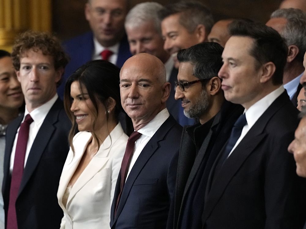 A cluster of well-dressed people, middle-aged, at an event.