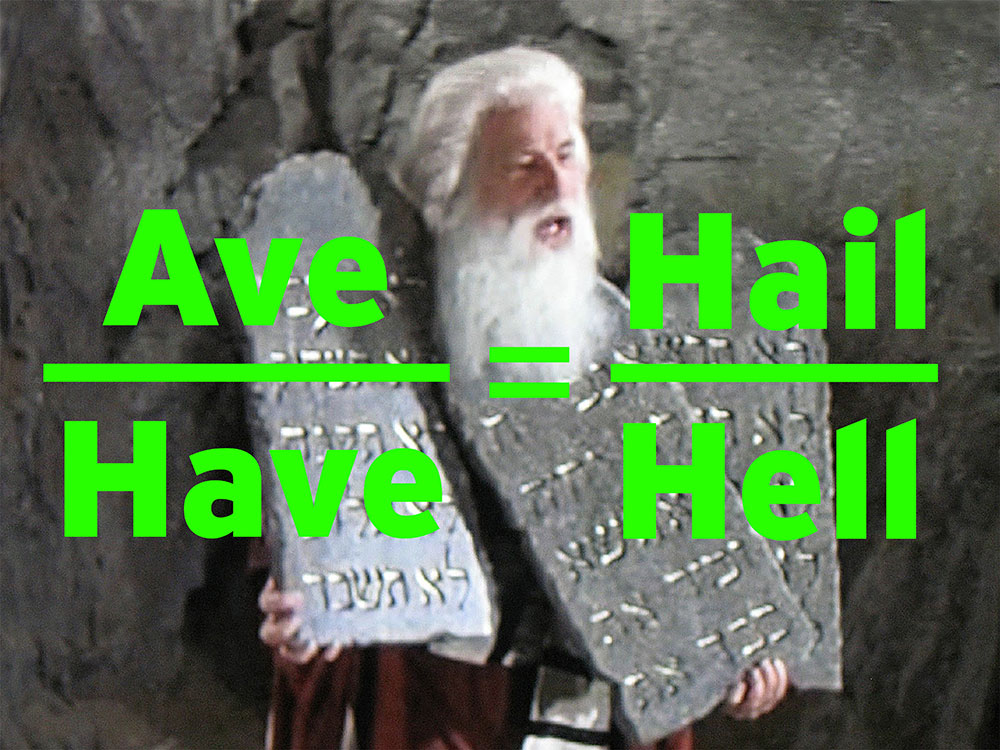 Mel Brooks plays Moses in a white beard and white hair. He is holding a collection of cartoonish ancient silver tablets in both hands. Across the screen in sans-serif bright green text, &ldquo;Ave&rdquo; over the word &ldquo;Have&rdquo; on the left, &ldquo;Hail&rdquo; over the word &ldquo;Hell&rdquo; on the right.