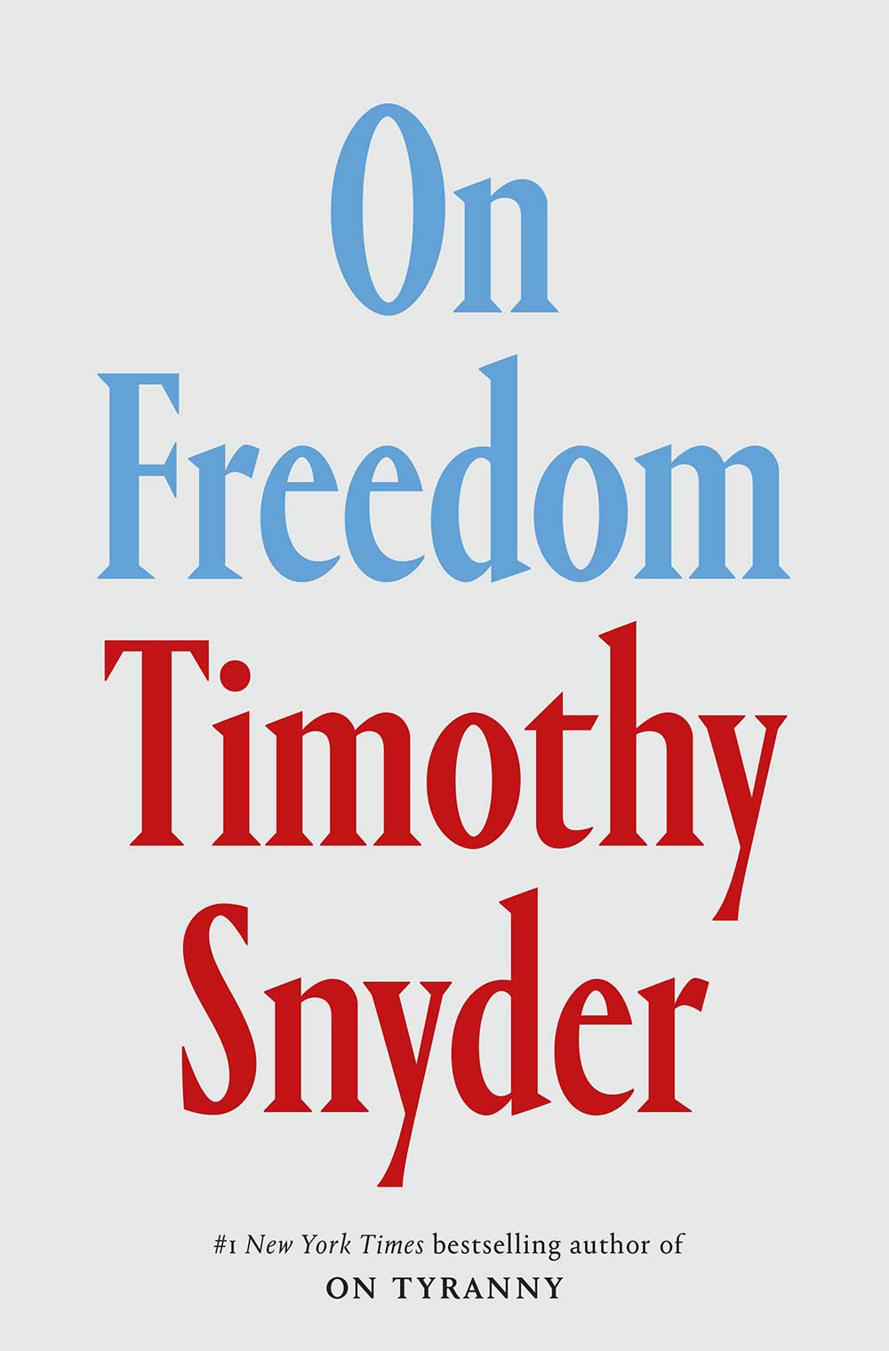 The book cover image for Timothy Snyder&rsquo;s 'On Freedom' features the book title text in light blue in serif typeface, and the author&rsquo;s name in red in the same typeface. The title text and author name are against an off-white background.