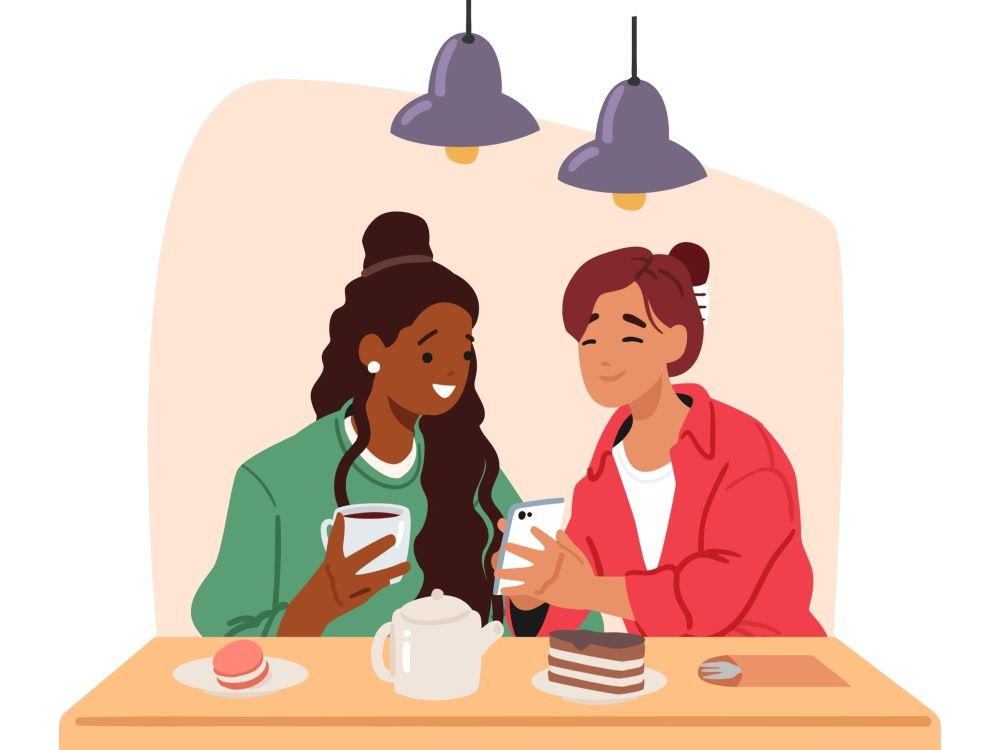 A digital illustration depicts two young women chatting over coffee. The woman on the left, with long dark wavy hair, is looking at the smartphone held by the woman on the right, with brown hair tied back.