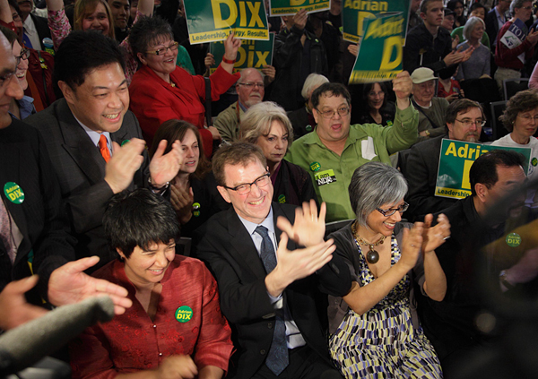 Adrian Dix grins, claps