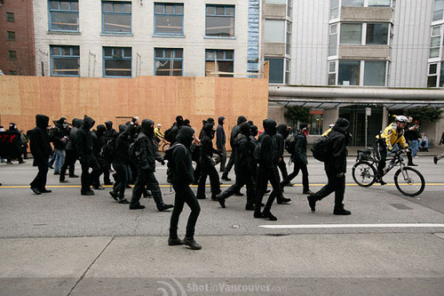 3_protest_meninblack.jpg
