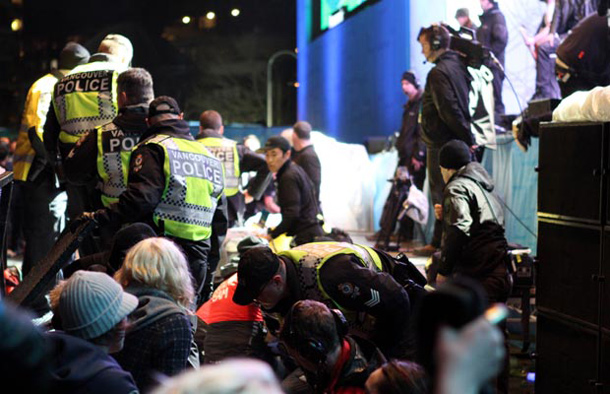 Concertgoer pushing over fence at Olympics venue
