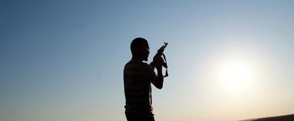 582px version of Sharif Ali and rifle