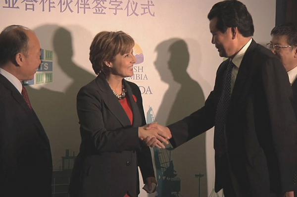 Christy Clark shaking hands