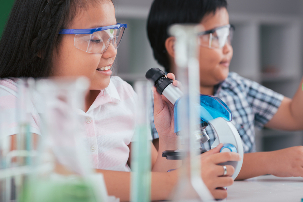 Kids at microscopes