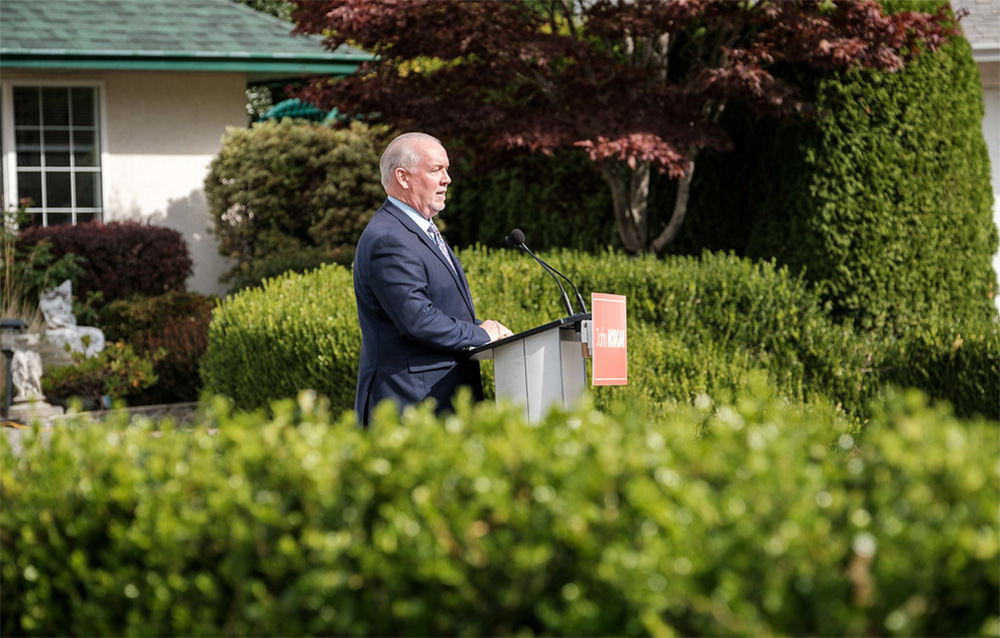 JohnHorganPodiumHouseYard.jpg