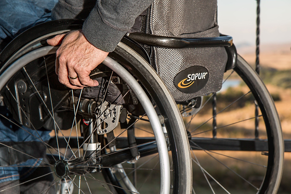 WheelchairWheelHand.jpg
