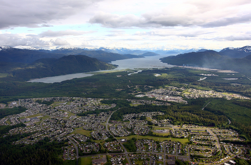 An aerial photo of the Kitimat residential area with the Douglas Channel in the background.