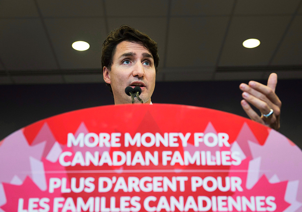 TrudeauMoreMoneyCanadiansPodium.jpg