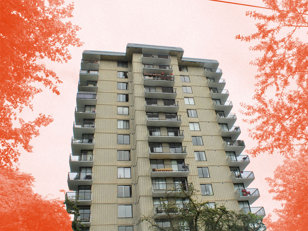 A beige high-rise apartment building with grey trim stands among deciduous trees in Vancouver&rsquo;s West End. The sky in the background and the trees on the side of the image are edited with a red colourway.