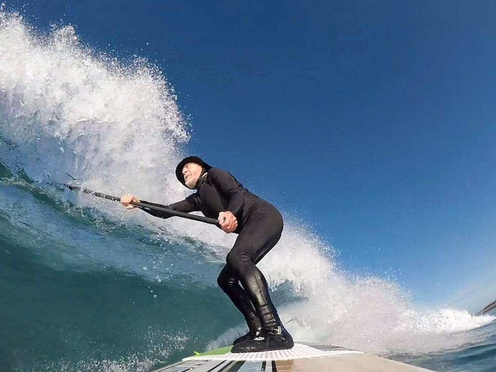 A man surfing.