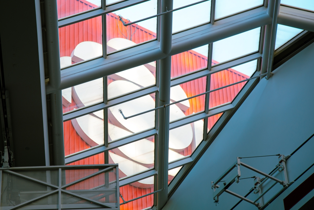 This CBC logo is found on the roof of the CBC Toronto headquarters at 205 Wellington St. W., seen through a window on the building&rsquo;s top floor.