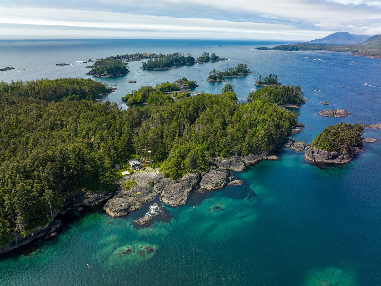 Overhead view of Haida Gwaii, turquoise waters