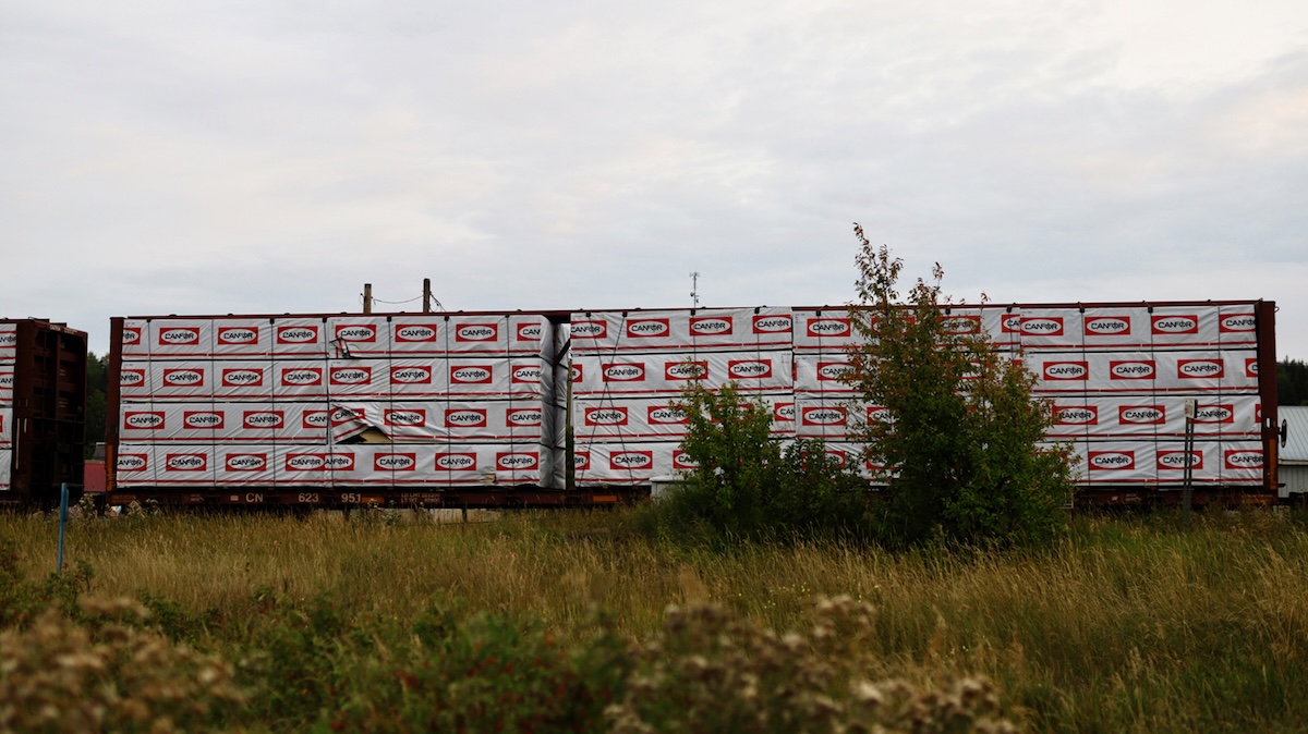 A train holds wood products from Canfor.