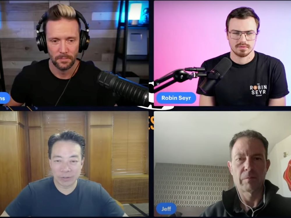 A screenshot shows four men with light-toned skin in separate locations participating in an online video session. Vancouver Mayor Ken Sim is in the lower left, wearing a black short-sleeved T-shirt in the wood-panelled mayor&rsquo;s office.