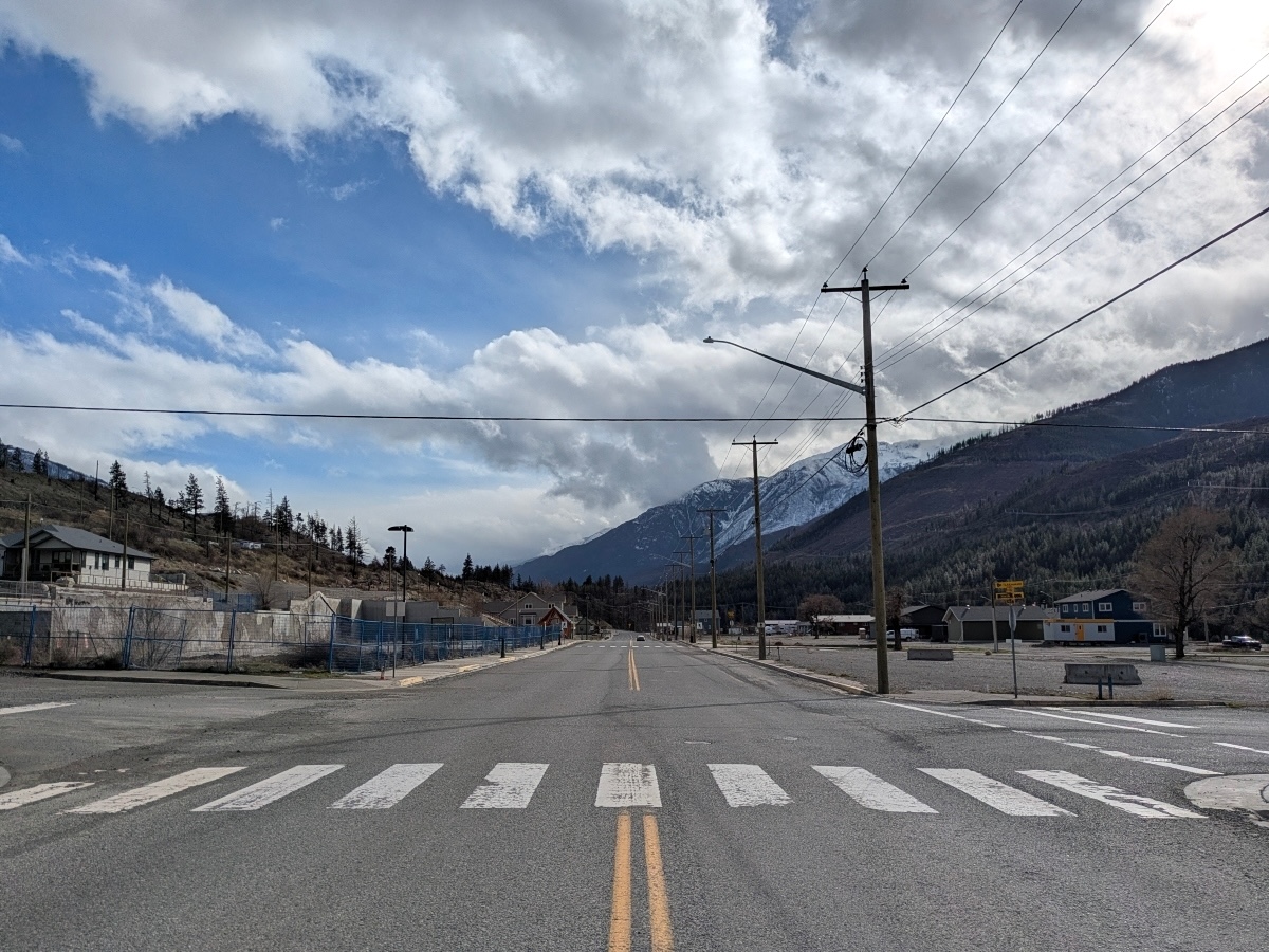A view down the main street of Lytton. Both sides of the street are still pretty empty, with no storefronts.