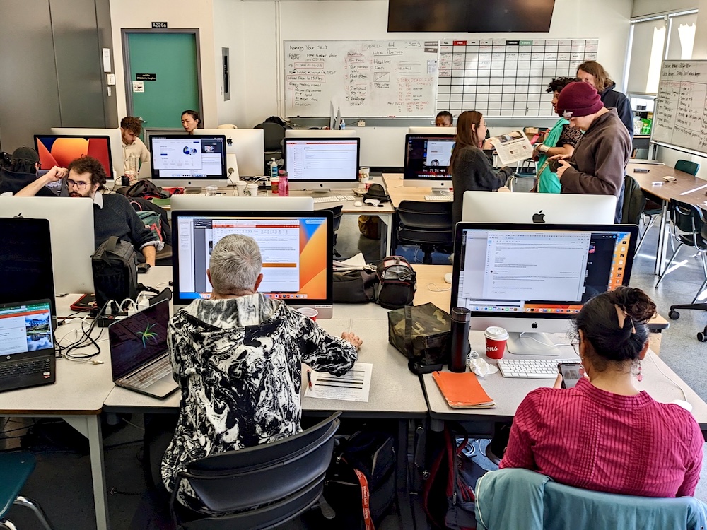 Students work on computers.