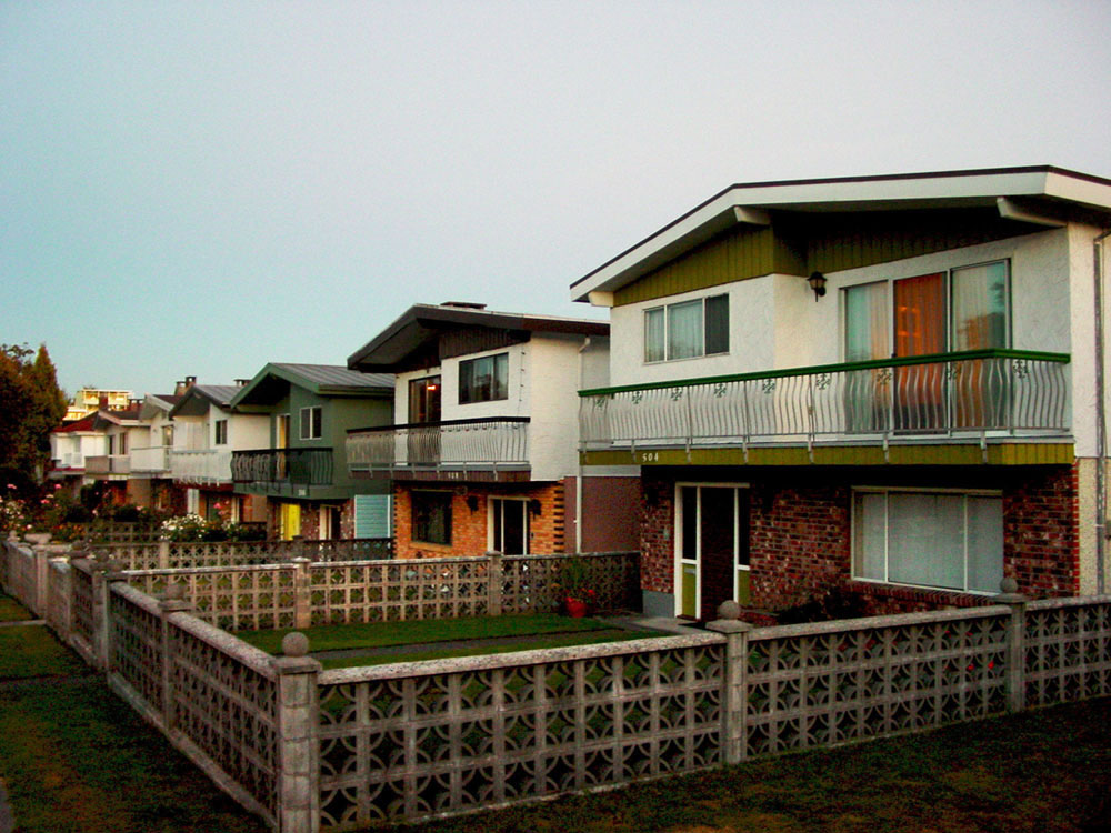 A row of Vancouver specials on a residential street in Vancouver.