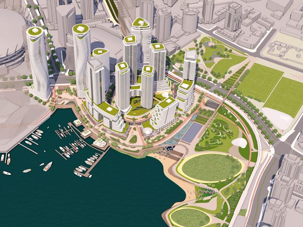 An artist&rsquo;s rendering shows an aerial view of towers, parks and waterfront near BC Place and viaduct offramps.