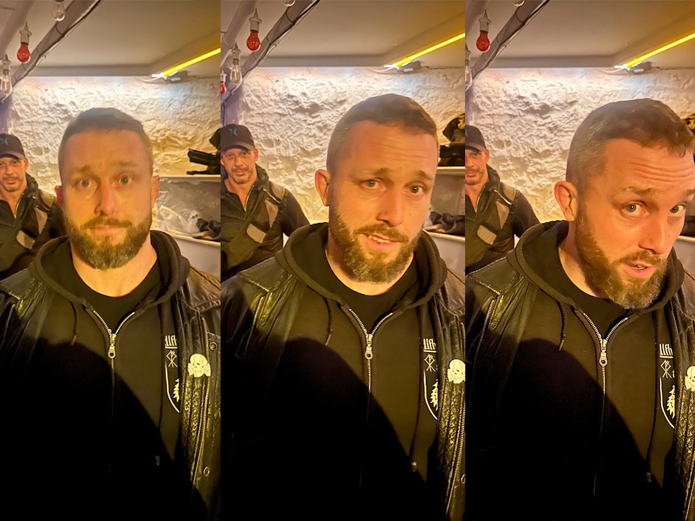 Three photos show slightly different expressions on the faces of two men. The man in the foreground has short brown hair and a beard and moustache. He wears a leather jacket over a hoodie.