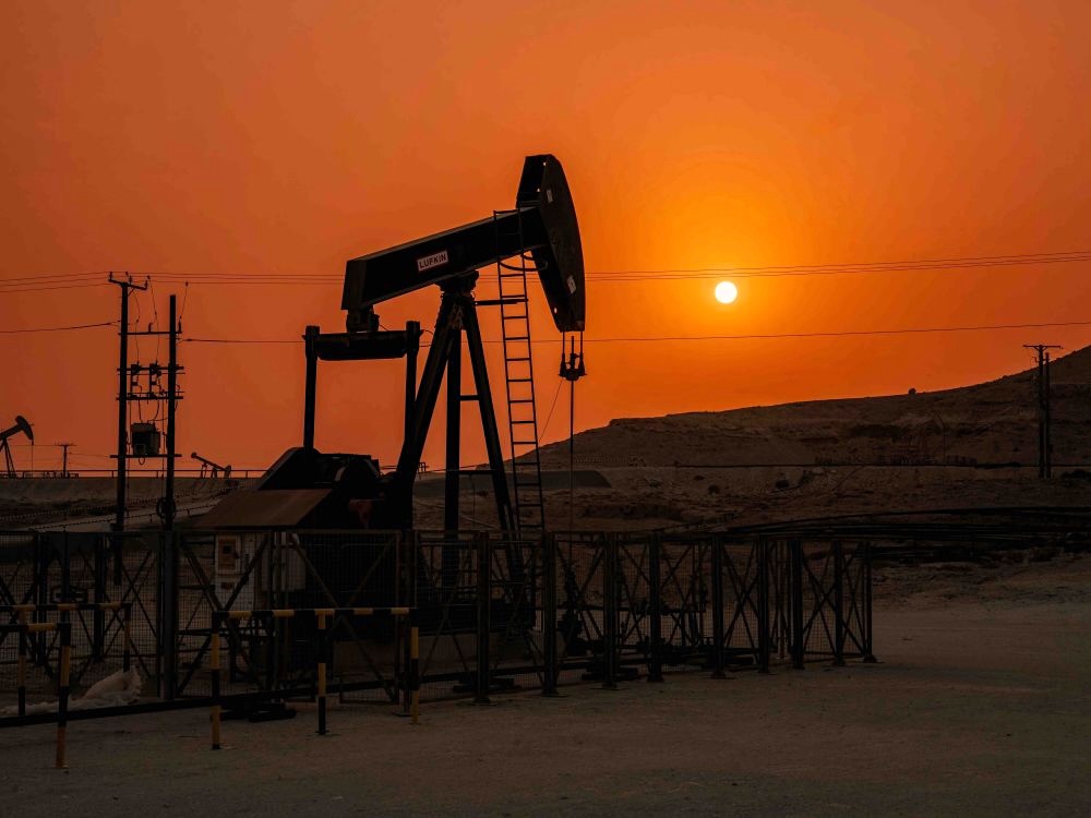 An oil rig at sunset.