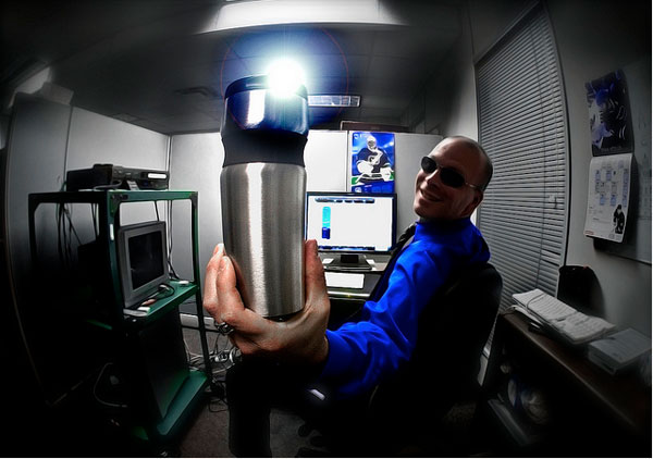 Office worker with coffee thermos