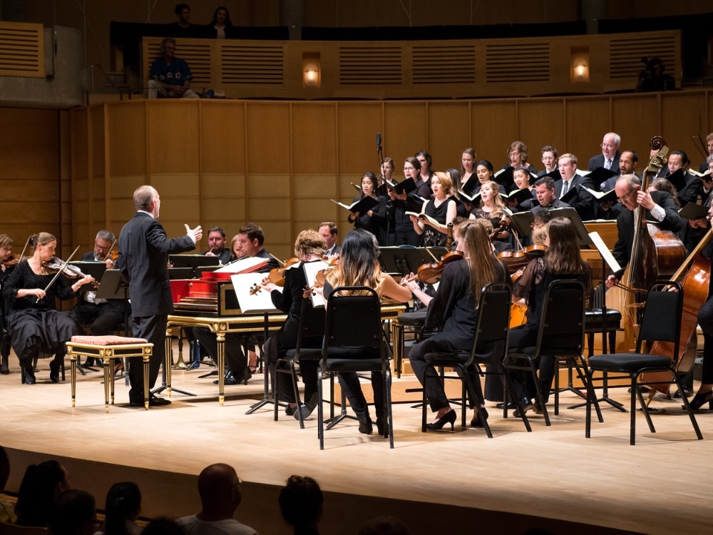 Alexander Weimann directing the Pacific Baroque Orchestra.