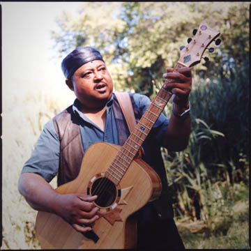Madagascar Slim and the Six String Nation Guitar